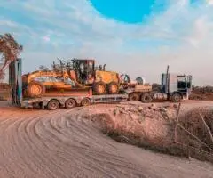 Transport Utilaje Construcții Agricole și Agabaritice pe Platformă