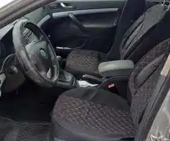 Skoda Octavia 2, an 2006, motor 1.9 TDI, 105 CP, cutie de viteze manuală - 5